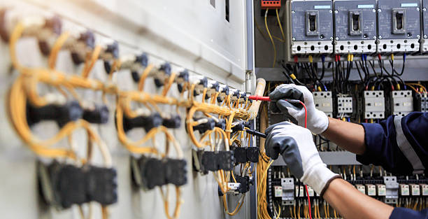 Professional Electrician technician working in Heartland, TX